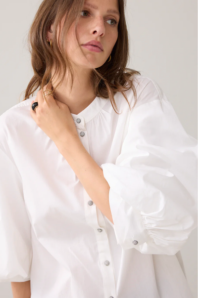 Blouse with diamond buttons